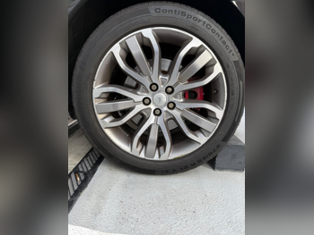 العجلات والجنوط (الرنقات) كونتيننتال صنع في التشيك \  4 مواسم  تشمل الرنق  21"