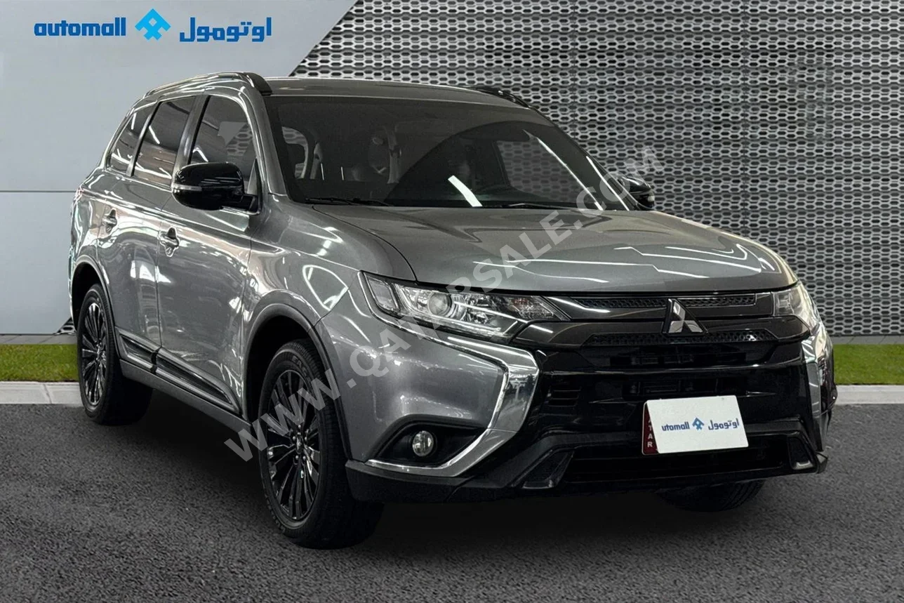 ميتسوبيشي أوت لاندر اتش ال 2022 اوتوماتيك 39,206 كم 4 سلندر دفع رباعي اس يو في فضي تحت الضمان