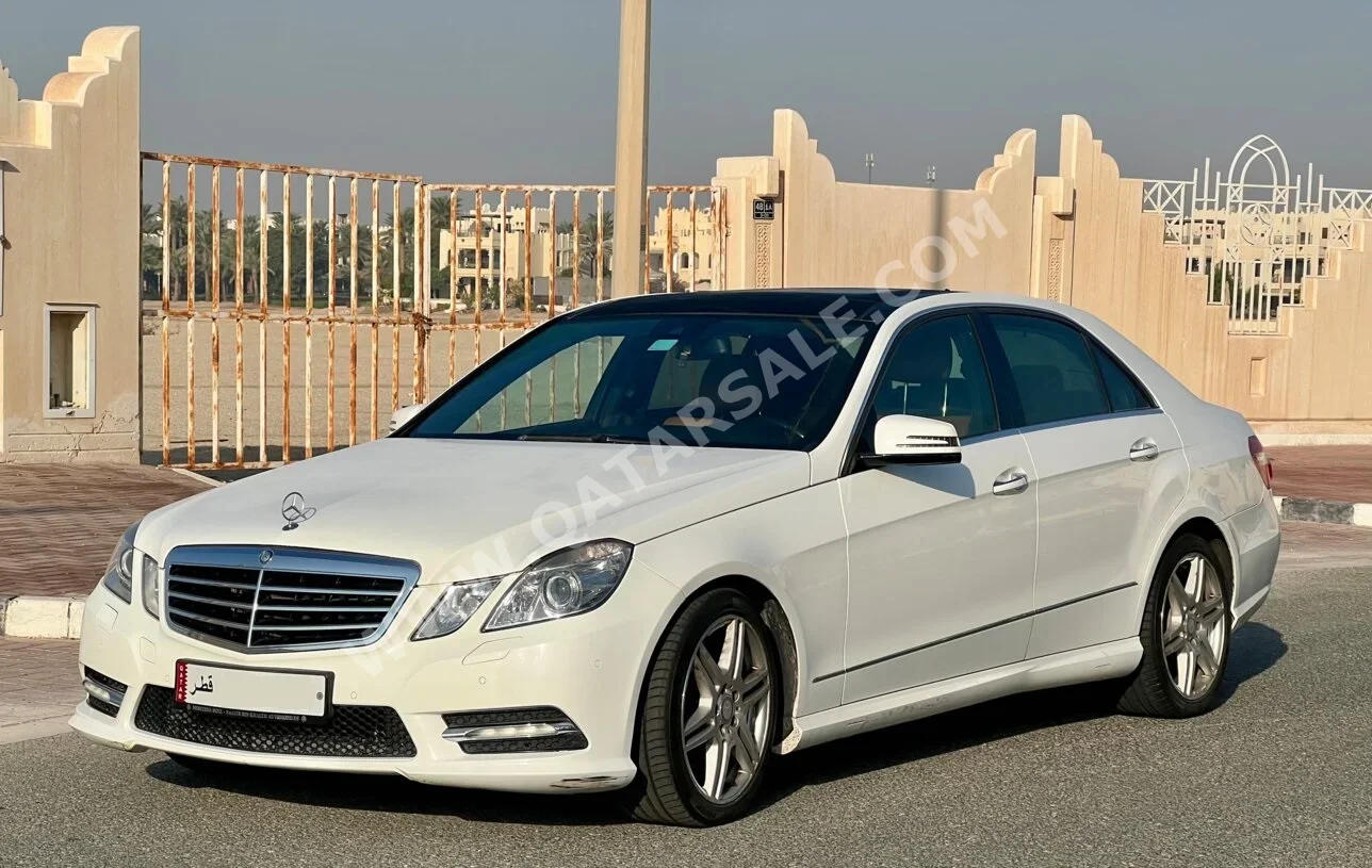 مرسيدس - بنز  اي - كلاس  300  2013  اوتوماتيك  142,090 كم  6 سلندر  دفع خلفي  سيدان  أبيض