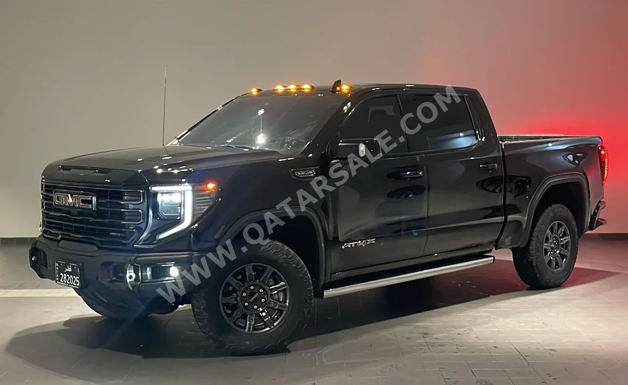 جي ام سي سييرا أي تي 4 أكس 2024 اوتوماتيك 49,000 كم 8 سلندر دفع رباعي بيكب أسود تحت الضمان