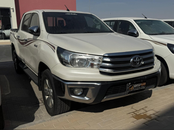 Toyota  Hilux  SR5  2019  Automatic  173,000 Km  4 Cylinder  Four Wheel Drive (4WD)  Pick Up  White