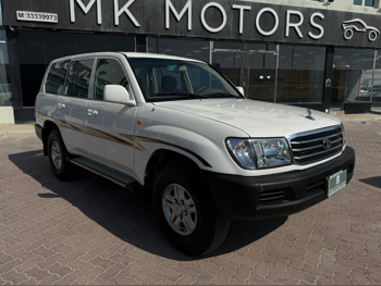 Toyota  Land Cruiser  GX  2001  Manual  449,000 Km  6 Cylinder  Four Wheel Drive (4WD)  SUV  White