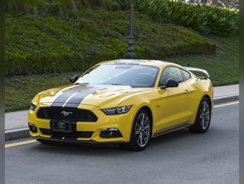 Ford  Mustang  GT  2016  Automatic  119,000 Km  8 Cylinder  Rear Wheel Drive (RWD)  Coupe / Sport  Yellow