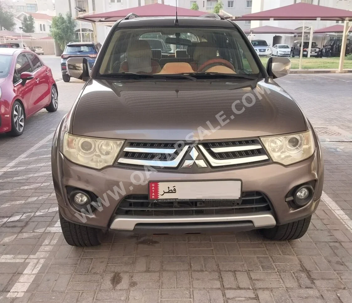 ميتسوبيشي  باجيرو  سبورت  2015  اوتوماتيك  142,000 كم  6 سلندر  دفع رباعي  اس يو في  بني
