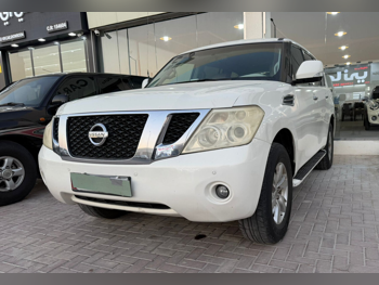 Nissan  Patrol  XE  2013  Automatic  300,000 Km  6 Cylinder  Four Wheel Drive (4WD)  SUV  White
