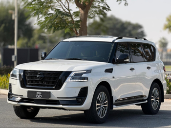 Nissan  Patrol  Platinum  2021  Automatic  77,000 Km  8 Cylinder  Four Wheel Drive (4WD)  SUV  White