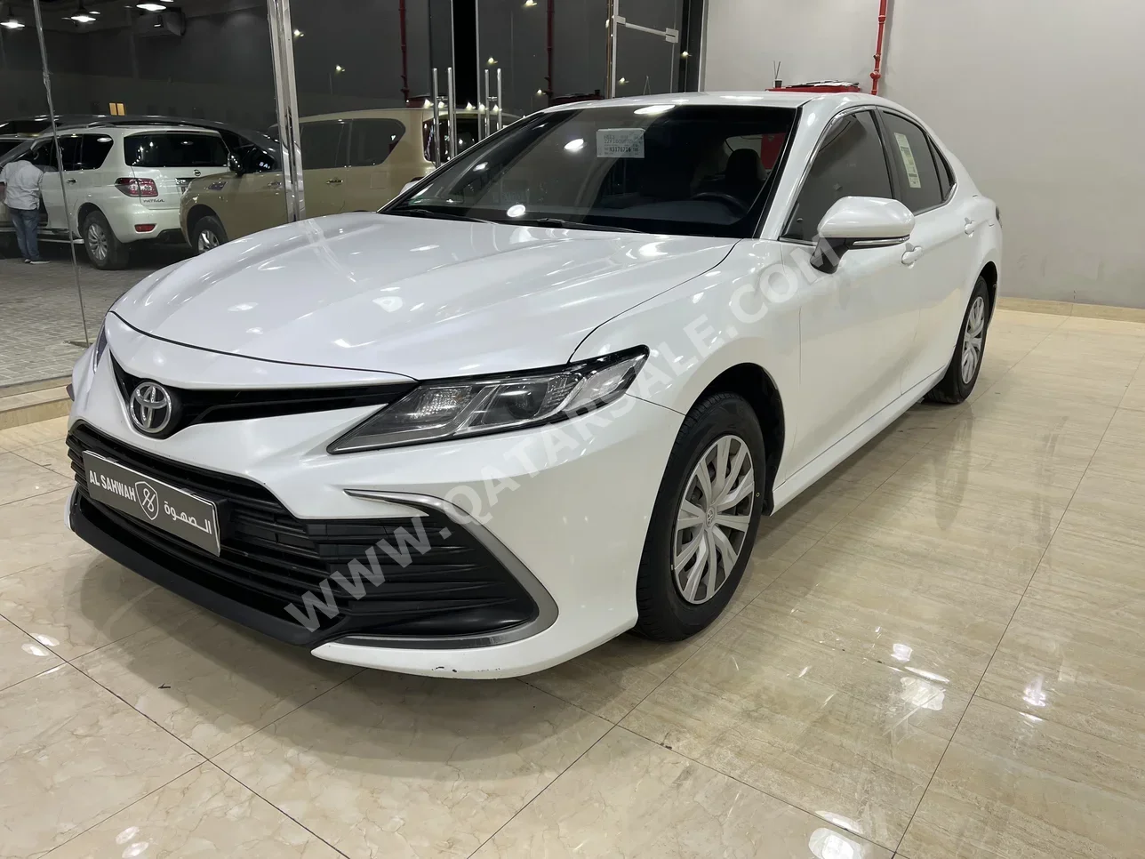 تويوتا  كامري  أل اي  2022  اوتوماتيك  104,000 كم  4 سلندر  سحب امامي  سيدان  أبيض