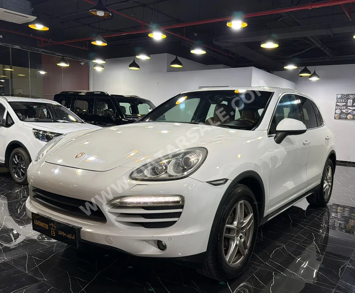 بورش  كيان  2013  اوتوماتيك  214,000 كم  6 سلندر  دفع رباعي  اس يو في  أبيض