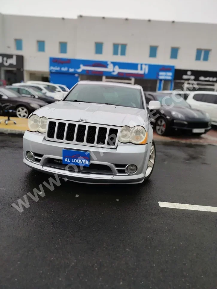 Jeep  Grand Cherokee  SRT-8  2010  Automatic  270,000 Km  8 Cylinder  Four Wheel Drive (4WD)  SUV  Silver