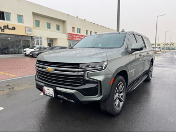 Chevrolet  Suburban  LT  2023  Automatic  42,000 Km  8 Cylinder  Four Wheel Drive (4WD)  SUV  Olive Green  With Warranty