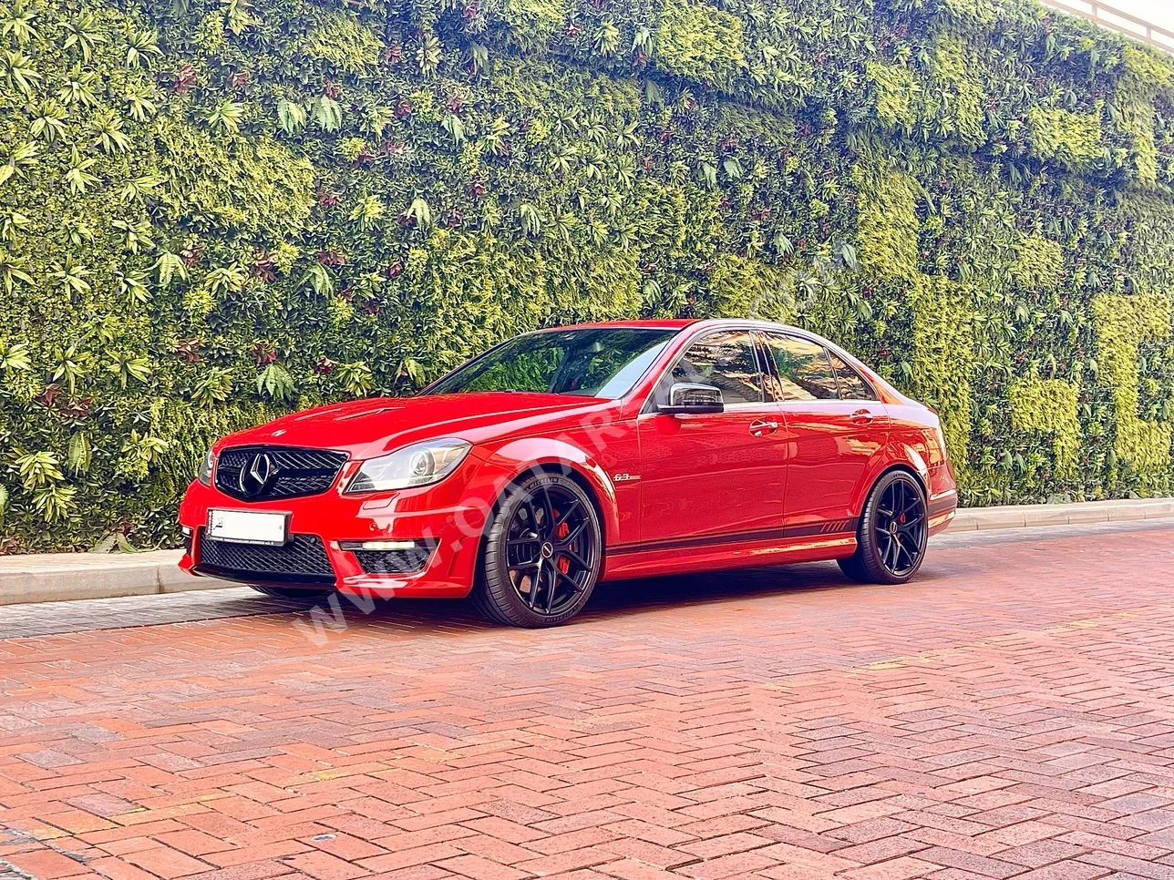 مرسيدس - بنز  سي - كلاس  63 AMG  2014  اوتوماتيك  178,000 كم  8 سلندر  دفع خلفي  سيدان  أحمر