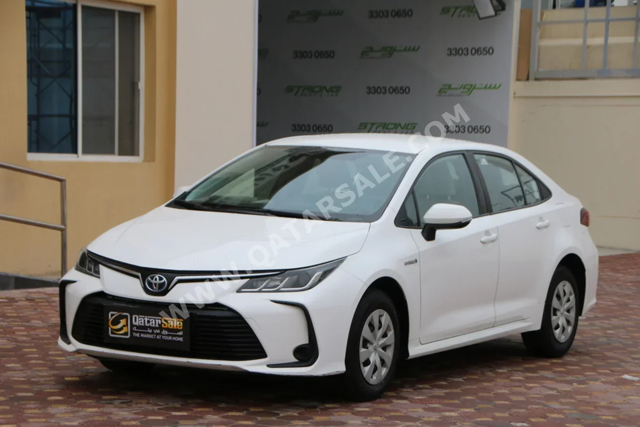 تويوتا  كورولا  هايبرد  2022  اوتوماتيك  98,000 كم  4 سلندر  سحب امامي  سيدان  أبيض