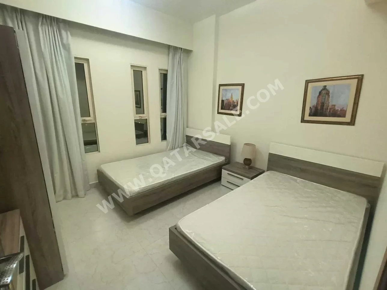 2 Bedrooms  Apartment  For Rent  in Doha -  Rawdat Al Khail  Fully Furnished