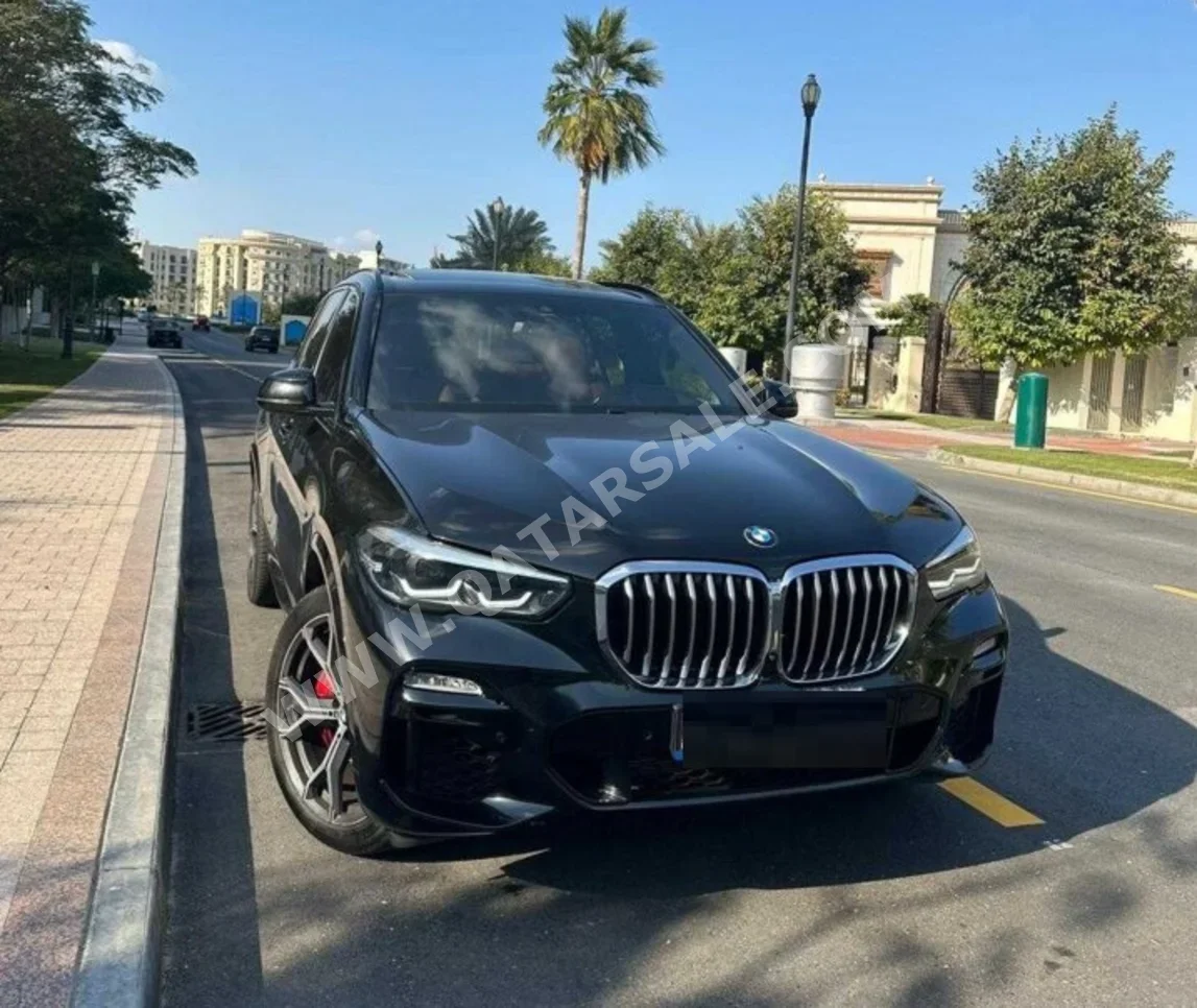 BMW  X-Series  X5 40i  2021  Automatic  64,000 Km  6 Cylinder  All Wheel Drive (AWD)  SUV  Black  With Warranty