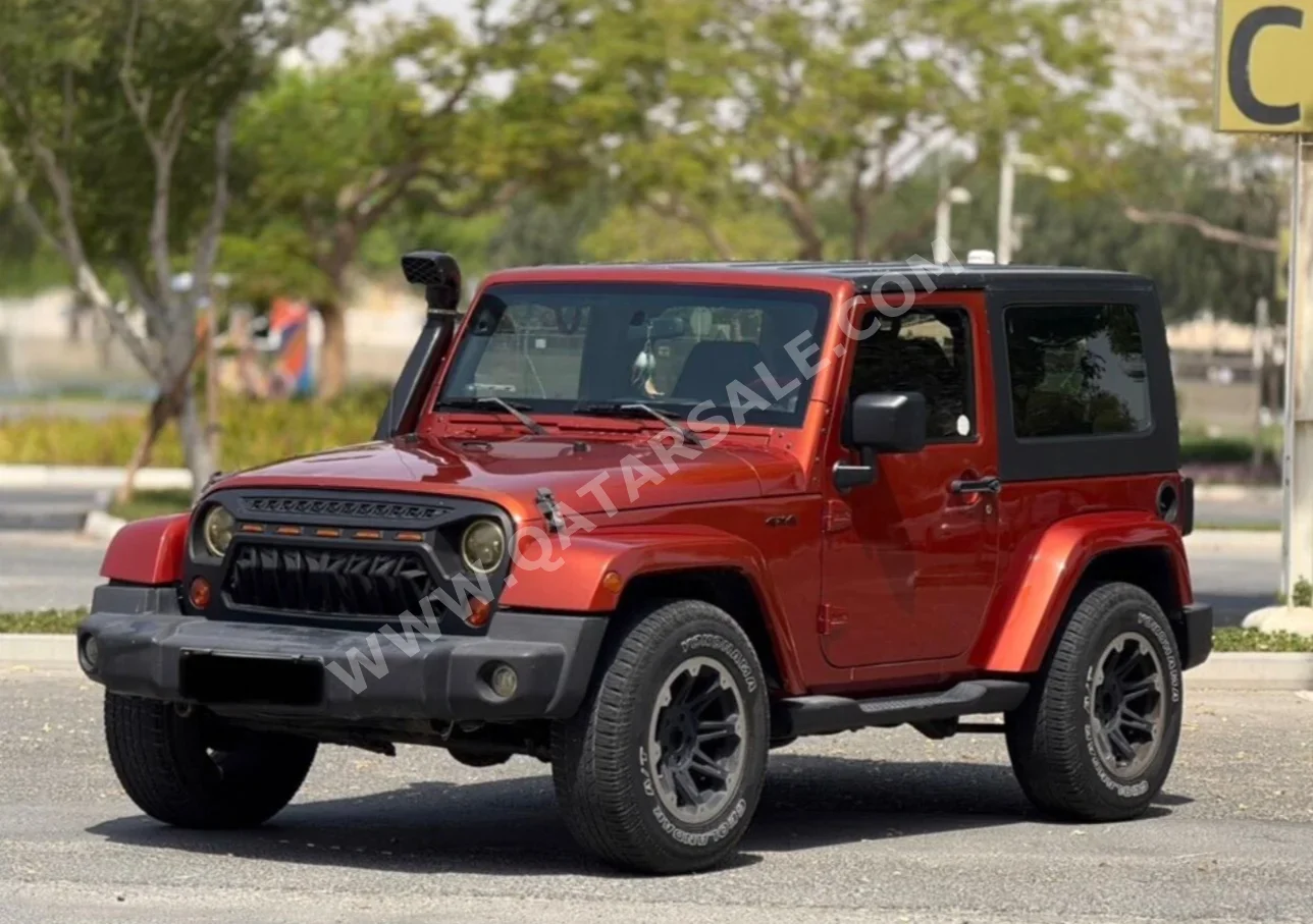 Jeep  Wrangler  Sahara  2009  Automatic  260,000 Km  6 Cylinder  Four Wheel Drive (4WD)  SUV  Orange