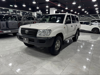 Toyota  Land Cruiser  G  2006  Manual  215,000 Km  6 Cylinder  Four Wheel Drive (4WD)  SUV  White