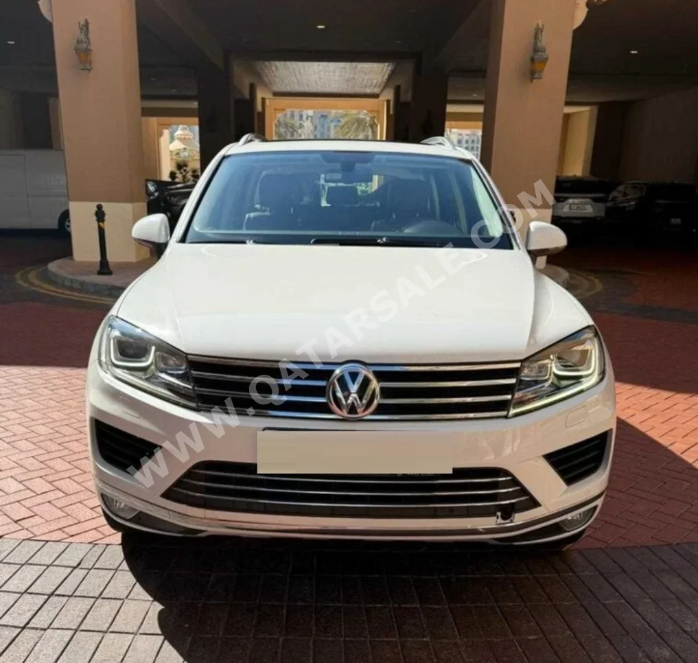 Volkswagen  Touareg  Comfort Line  2015  Automatic  104,599 Km  6 Cylinder  Four Wheel Drive (4WD)  SUV  White