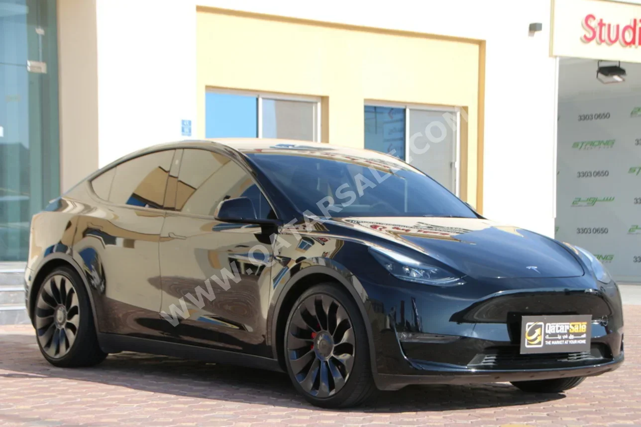 Tesla  Model Y  2023  Automatic  62,000 Km  0 Cylinder  All Wheel Drive (AWD)  Sedan  Black  With Warranty