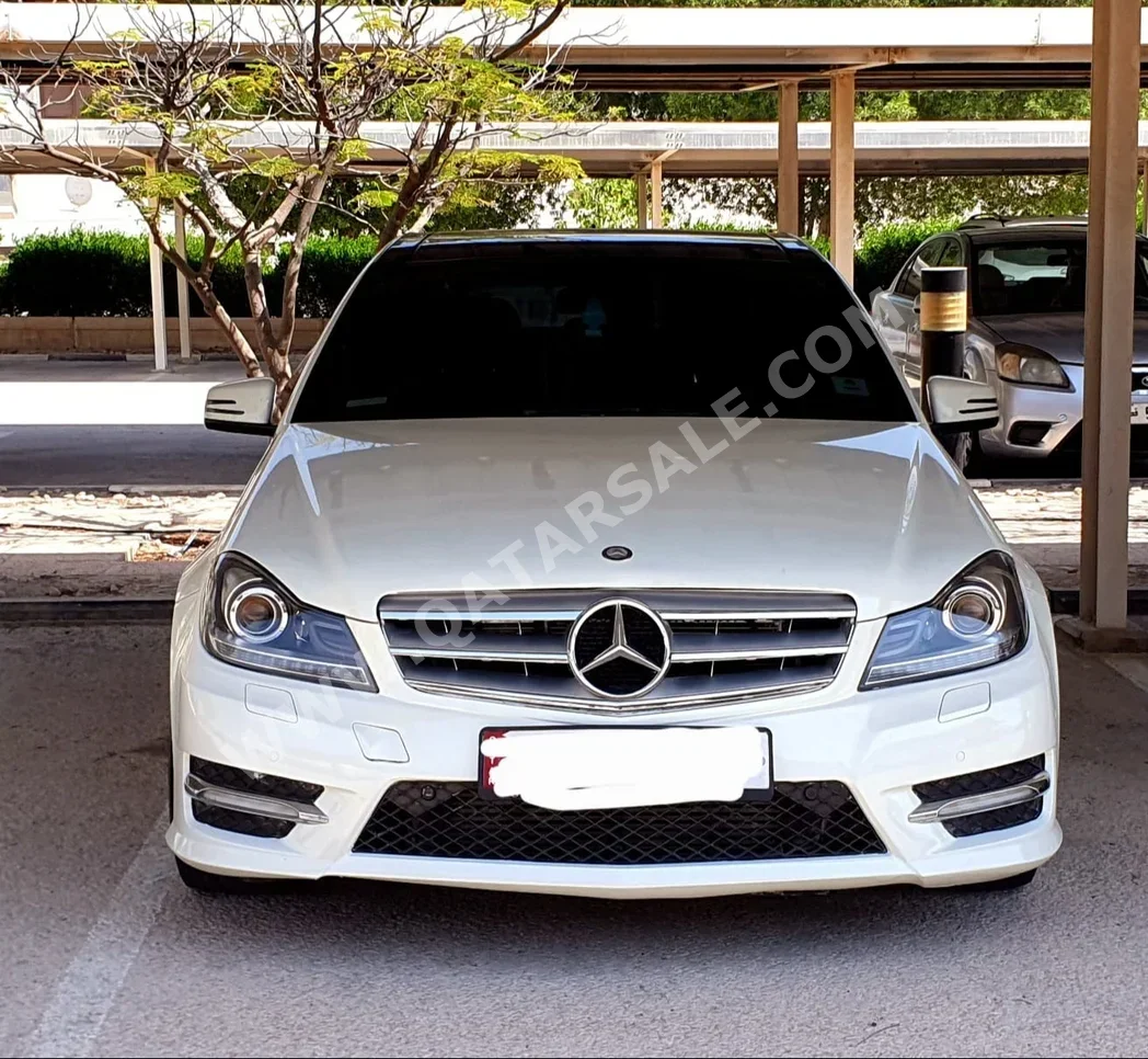 Mercedes-Benz  C-Class  200  2012  Automatic  240,000 Km  4 Cylinder  Rear Wheel Drive (RWD)  Sedan  White