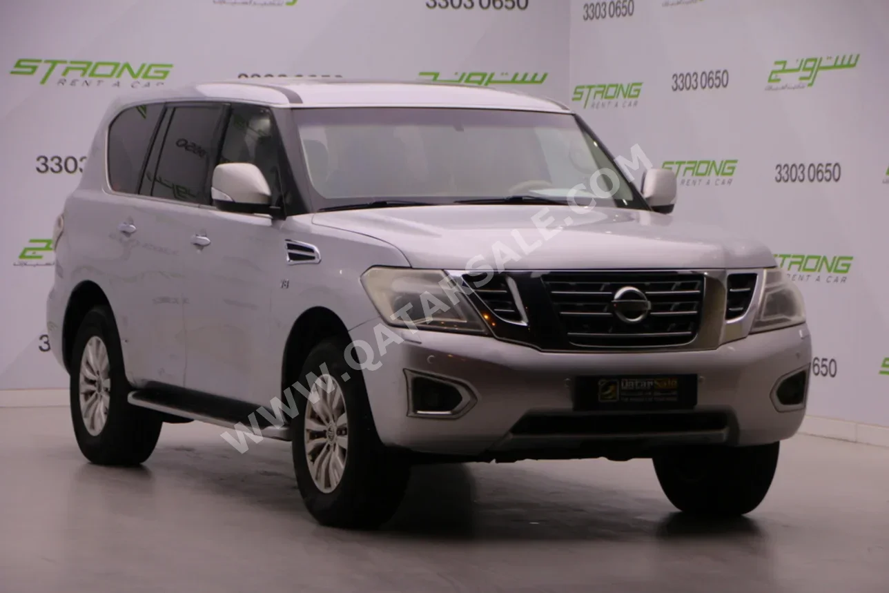 نيسان  باترول  اس اي  2015  اوتوماتيك  350,000 كم  8 سلندر  دفع رباعي  اس يو في  فضي