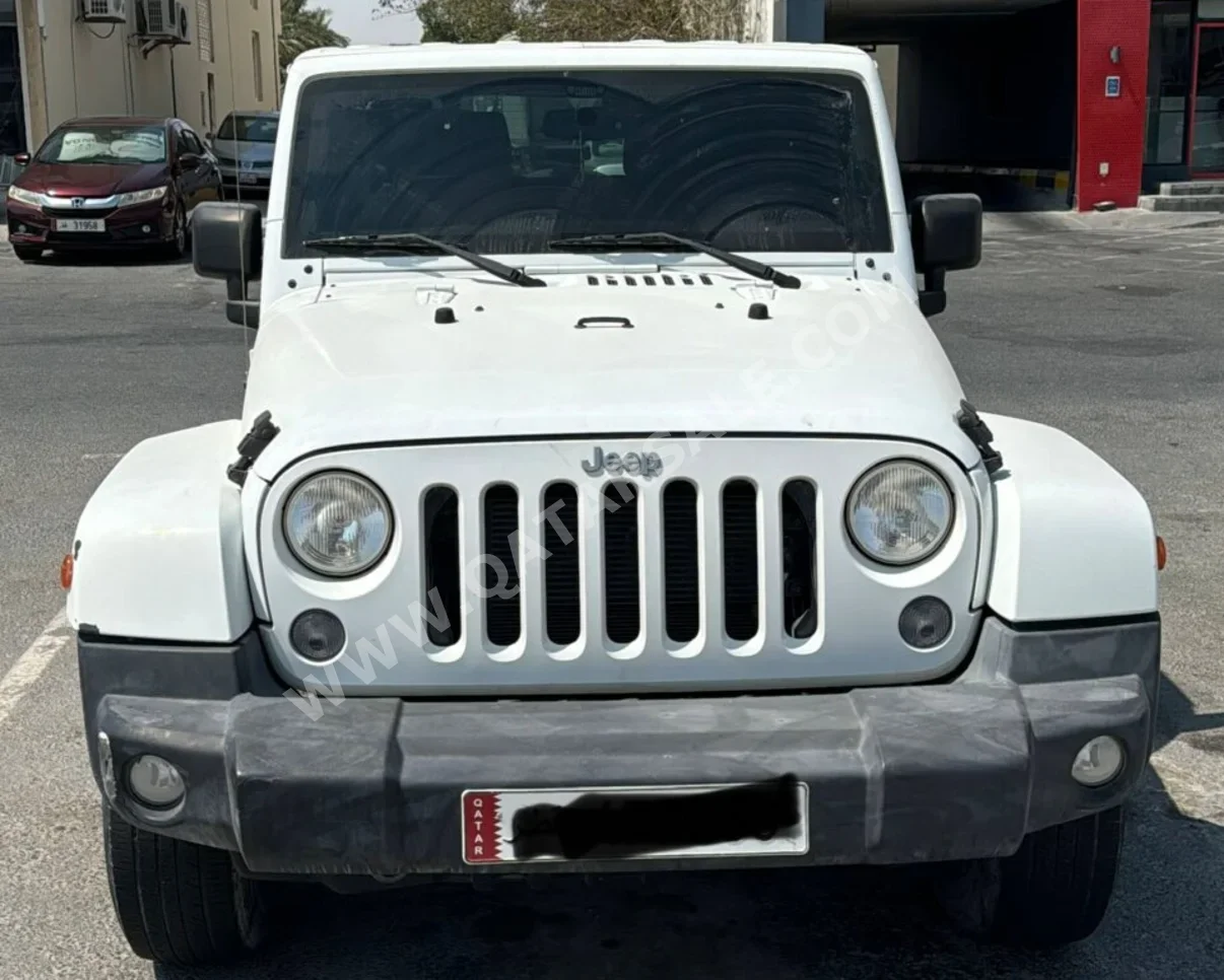 جييب  رانجلار  سبورت  2015  اوتوماتيك  115,000 كم  6 سلندر  دفع رباعي  اس يو في  أبيض