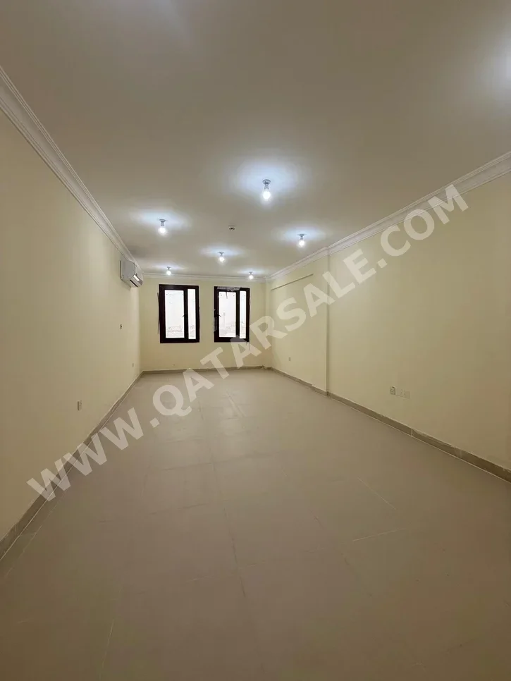 2 Bedrooms  Apartment  For Rent  in Umm Salal -  Umm Salal Ali  Not Furnished