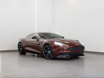 Aston Martin  Vanquish  2013  Automatic  70,000 Km  12 Cylinder  Rear Wheel Drive (RWD)  Coupe / Sport  Maroon
