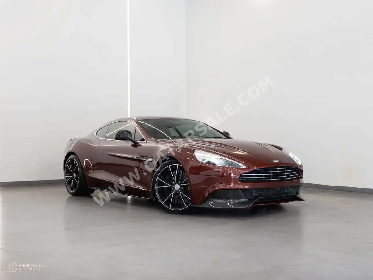 Aston Martin  Vanquish  2013  Automatic  70,000 Km  12 Cylinder  Rear Wheel Drive (RWD)  Coupe / Sport  Maroon