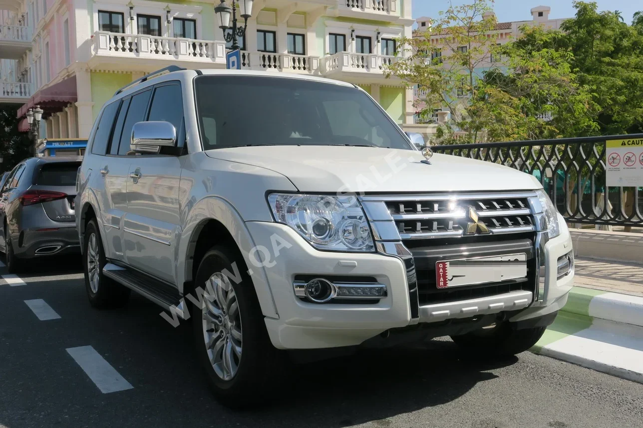 ميتسوبيشي  باجيرو  2020  اوتوماتيك  38,000 كم  6 سلندر  دفع رباعي  اس يو في  أبيض