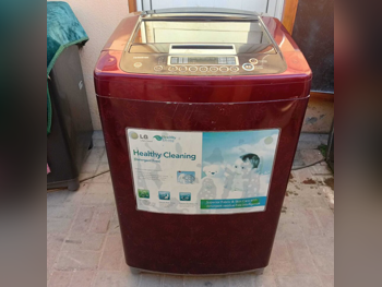 غسالة ملابس & الكل في واحد ال جي \ غسالة تحميل علوي أحمر