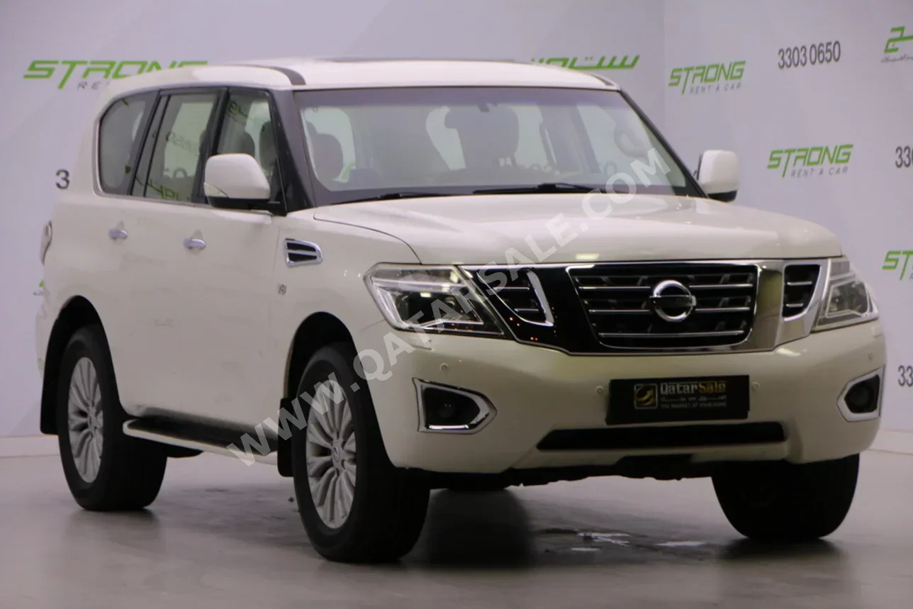 نيسان  باترول  ال اي  2014  اوتوماتيك  218,000 كم  8 سلندر  دفع رباعي  اس يو في  أبيض