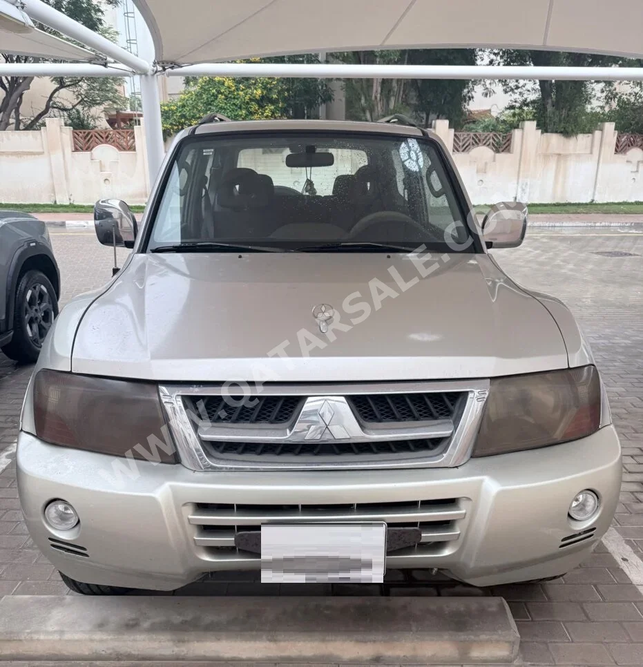 Mitsubishi  Pajero  Montero Sport  2003  Automatic  297,188 Km  6 Cylinder  All Wheel Drive (AWD)  SUV  Beige