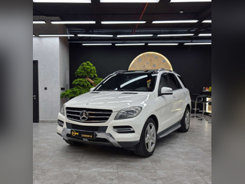 مرسيدس - بنز  ام ال  350  2014  اوتوماتيك  215,000 كم  6 سلندر  دفع رباعي  اس يو في  أبيض