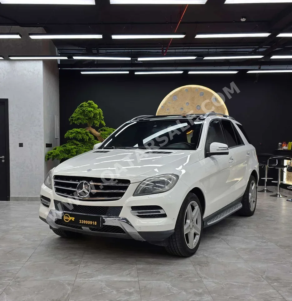 مرسيدس - بنز  ام ال  350  2014  اوتوماتيك  215,000 كم  6 سلندر  دفع رباعي  اس يو في  أبيض