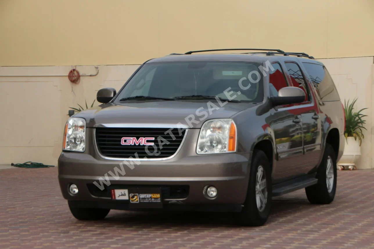 GMC  Yukon  XL  2011  Automatic  209,000 Km  8 Cylinder  Four Wheel Drive (4WD)  SUV  Brown