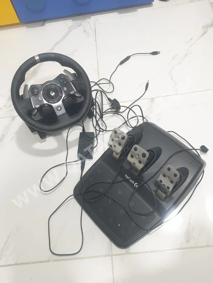 ملحقات اجهزة العاب الفيديو عجلة القيادة مع مغير السرع  - لوجيتك  - جي 29  - أسود