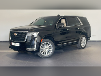 Cadillac  Escalade  Premium  2023  Automatic  12,800 Km  8 Cylinder  Four Wheel Drive (4WD)  SUV  Black  With Warranty