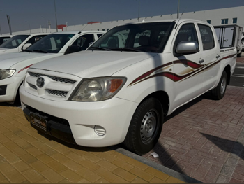 تويوتا  هاي لوكس  2007  عادي  500,000 كم  4 سلندر  دفع رباعي  بيكب  أبيض