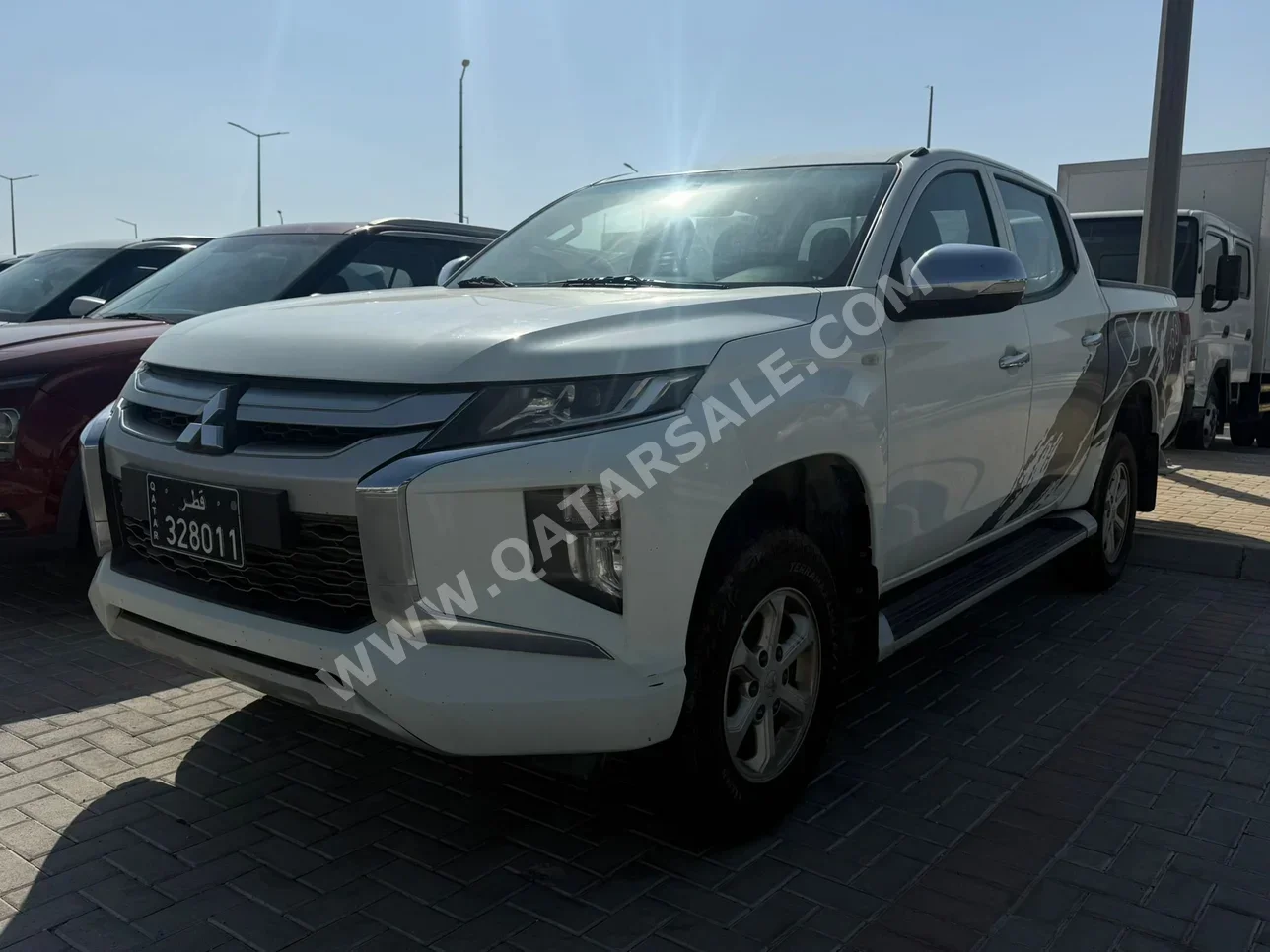 Mitsubishi  L 200  2020  Manual  42,000 Km  4 Cylinder  Rear Wheel Drive (RWD)  Pick Up  White
