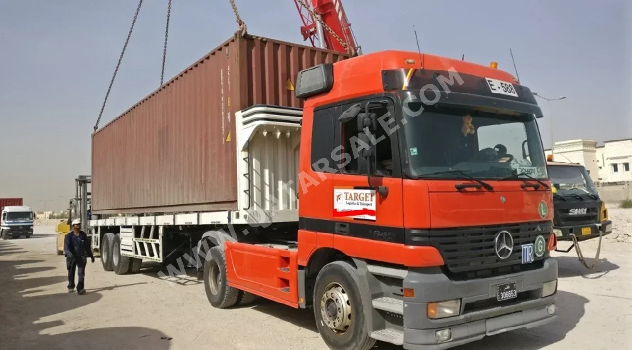 شاحنات مرسيدس  اكتروس - اللون برتقالي  2003