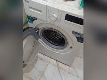 غسالة ملابس & الكل في واحد غسالة تحميل أمامي أبيض اي ++