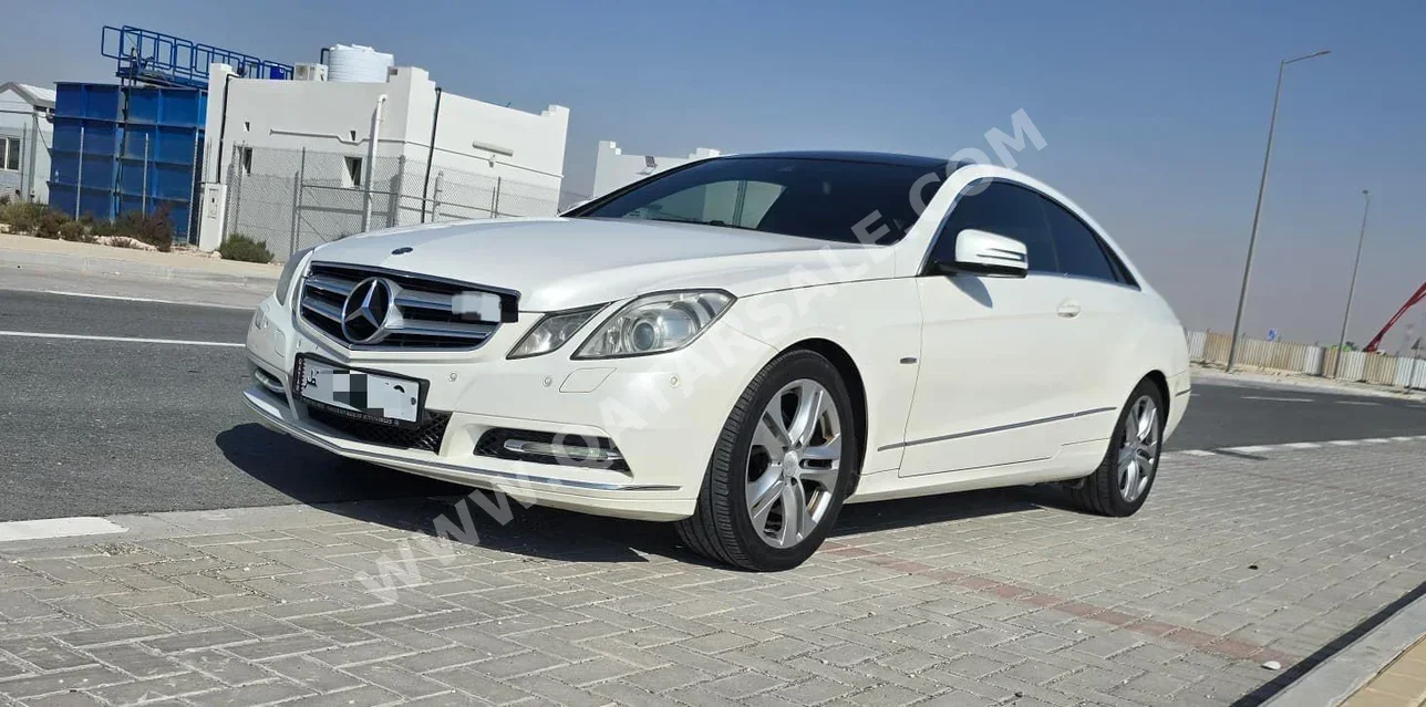 مرسيدس - بنز اي - كلاس 200 2012 اوتوماتيك 235,000 كم 4 سلندر دفع خلفي سيدان أبيض