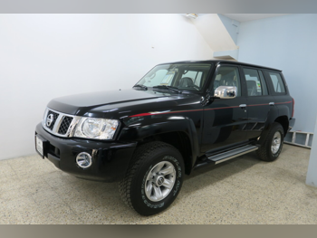 Nissan  Patrol  Safari  2024  Manual  0 Km  6 Cylinder  Four Wheel Drive (4WD)  SUV  Black  With Warranty