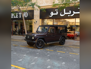 مرسيدس - بنز  جي - كلاس  بيك اب  1986  عادي  26,800 كم  8 سلندر  دفع رباعي  كلاسك  عنابي و أسود