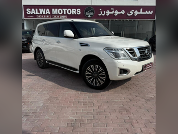 Nissan  Patrol  SE  2015  Automatic  225,000 Km  8 Cylinder  Four Wheel Drive (4WD)  SUV  White