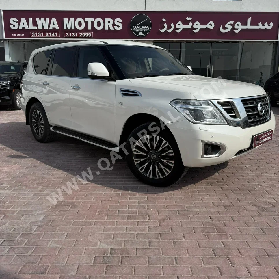 Nissan  Patrol  SE  2015  Automatic  225,000 Km  8 Cylinder  Four Wheel Drive (4WD)  SUV  White