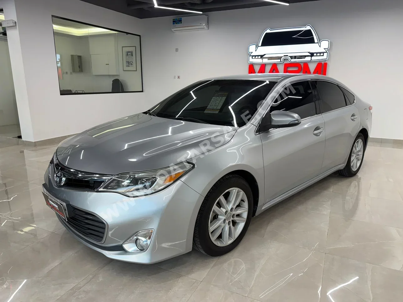 تويوتا أفالون اكس ال اي 2015 اوتوماتيك 184,000 كم 6 سلندر سحب امامي سيدان فضي