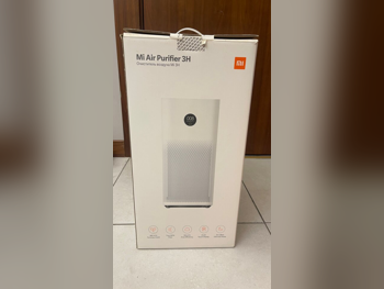 أجهزة تنقية الهواء وأجهزة العلاج - أبيض