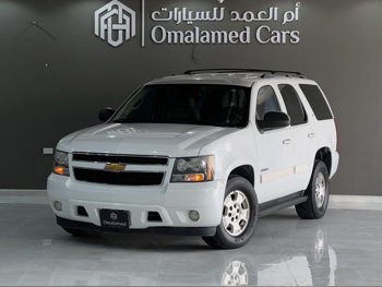 Chevrolet  Tahoe  LT  2012  Automatic  233,000 Km  8 Cylinder  All Wheel Drive (AWD)  SUV  White