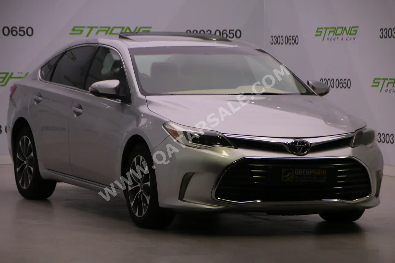 تويوتا أفالون 2016 اوتوماتيك 150,000 كم 6 سلندر سحب امامي سيدان فضي